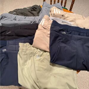 9 pair of Men’s golf pants. 30 x 32. All Adidas brands